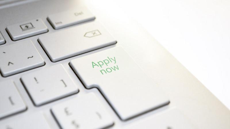 An image of a keyboard button reading &#039;Apply now&#039;
