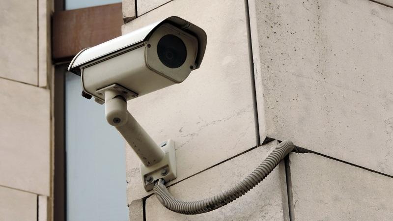 An image of a CCTV camera affixed to a wall