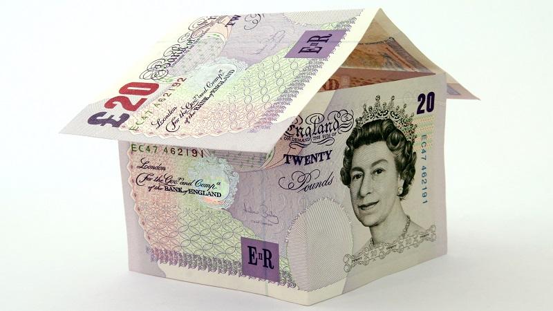An image of a simple model of a house made of two £20 notes