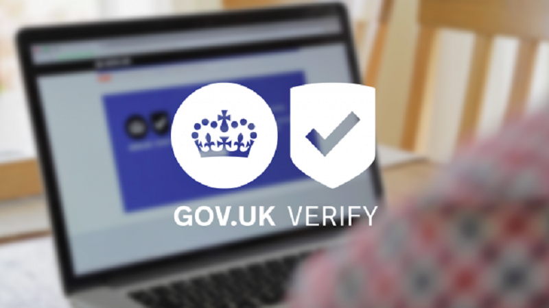 An image of the GOV.UK Verify logo with an out-of-focus computer in the background